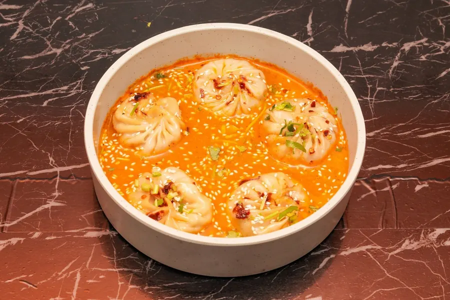 Jhol momo in spiced soup